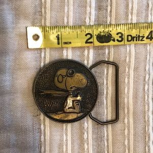 Vintage Snoopy pilot brass belt buckle